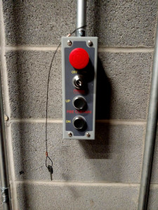A Fire Safety Curtain hoist operating station.  This station makes closing the fire safety curtain regularly easy.  The emergency release is located nearby.  Photo courtesy of Steve Miller, University of Cincinnati, CCM.
